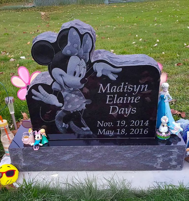 custom headstone in jet black granite installed in Kendallville, IN