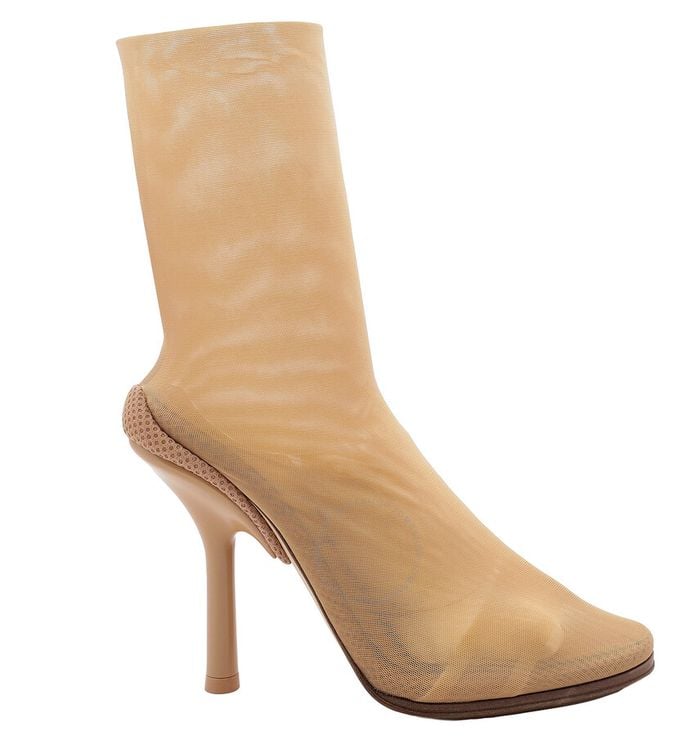 a woman's burberry shoe with a high heel and a high heel