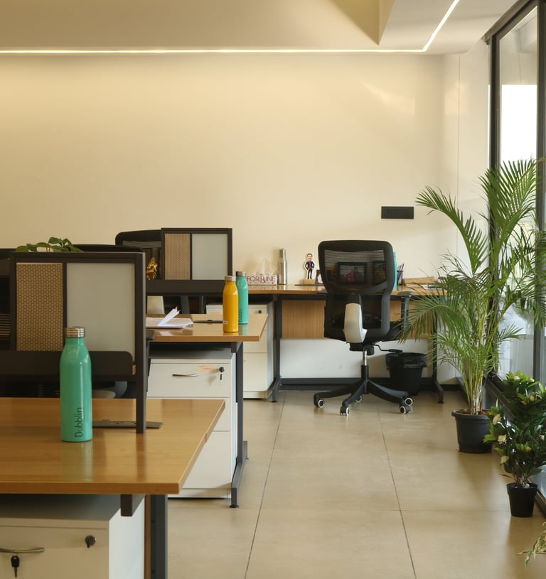 a room with a desk and a chair- Clayworks 4B