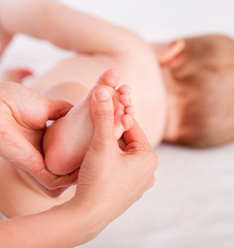 a baby's feet and feet are shown in this picture