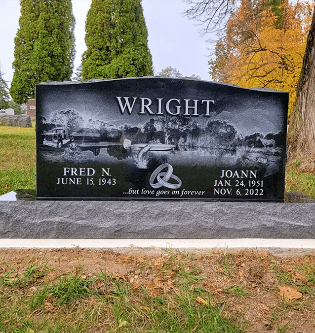 campanion headstone in jet black granite with laser etched artwork