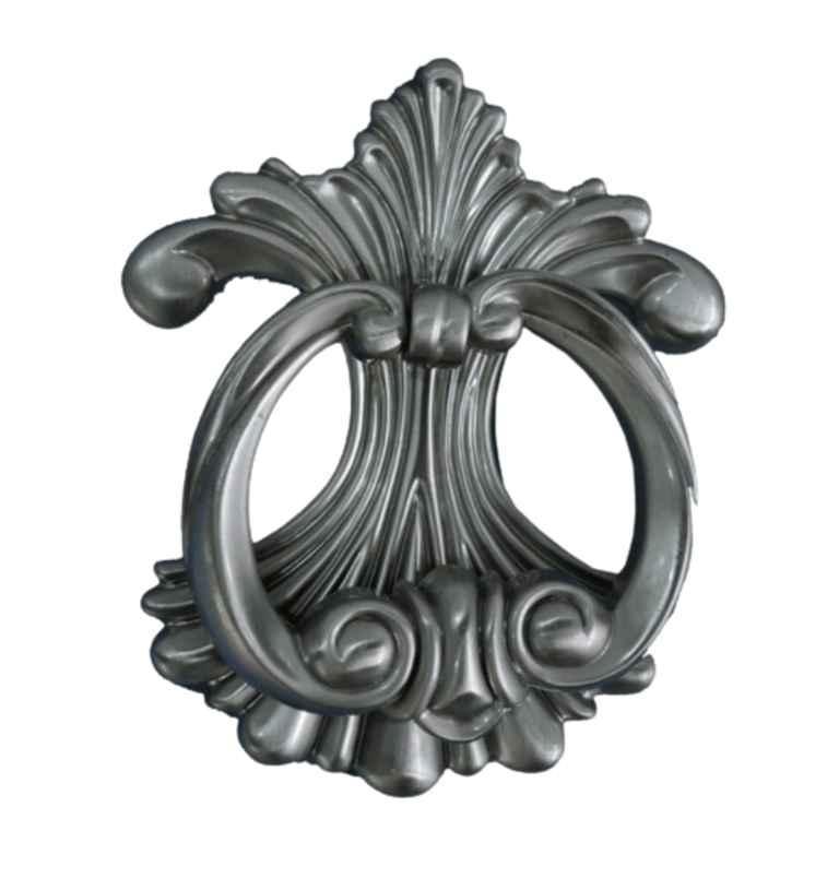 a metal door handle with a decorative design