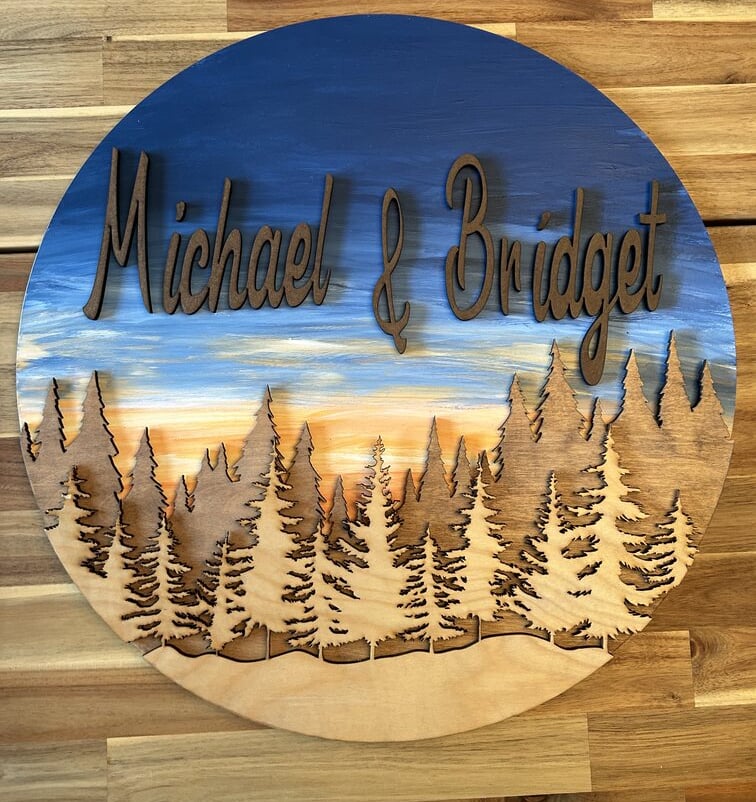 laser cut and painted personalized wooden forest wall or door hanger