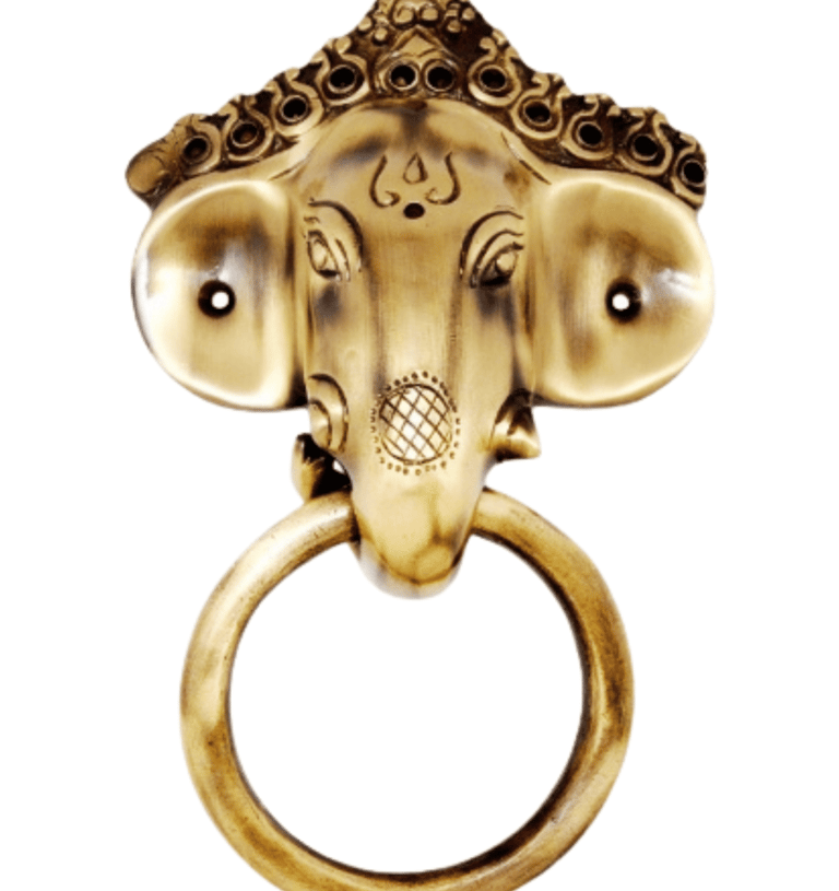 a gold ring with a head of an elephant
