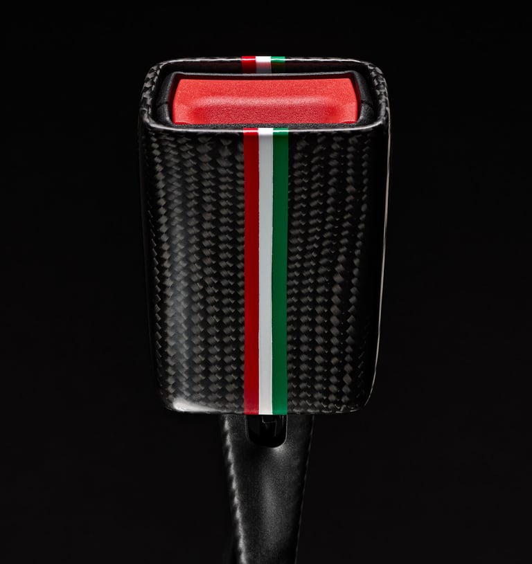 Product photography - a close up of a red, green and white seat belt