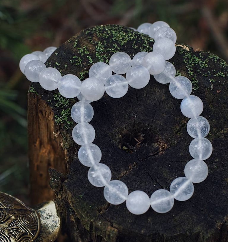 two bracelets on a stone