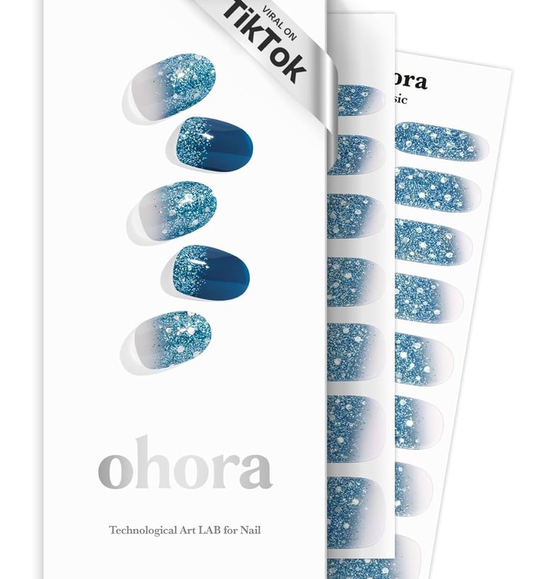 Ohora semi-cured gel nail strips in a blue glitter ombre design with viral TikTok packaging.