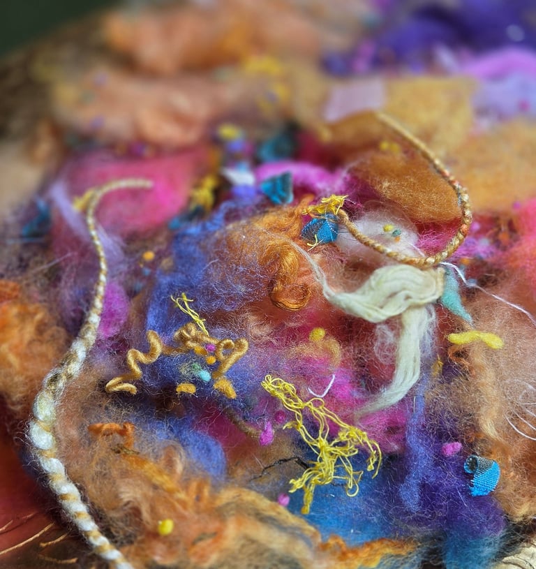 a close up of a piece of artisanned fibers with a needle - tipped