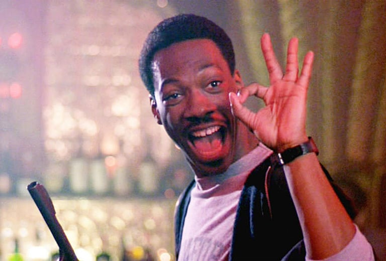 a man flashing the okay symbol