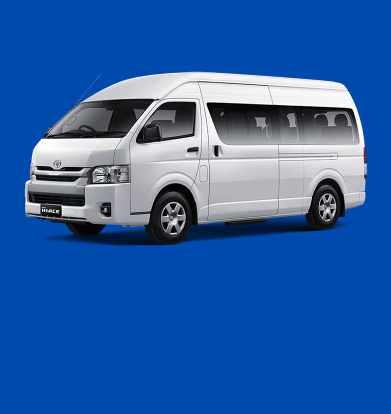 Toyota Hiace putih jumlah tempat duduk 15.