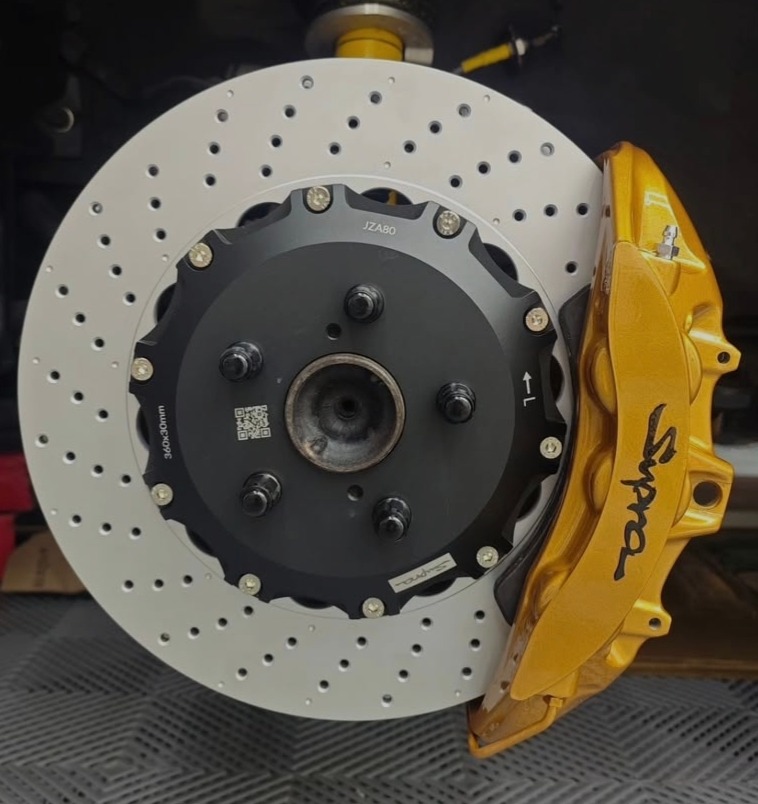 Front Brembo Gold CTSV calipers paired with 360x30mm drilled 2-piece rotors