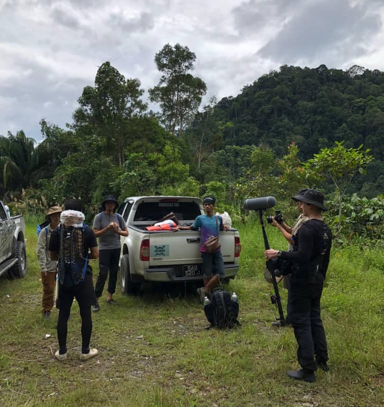 a group of people shooting a documentary