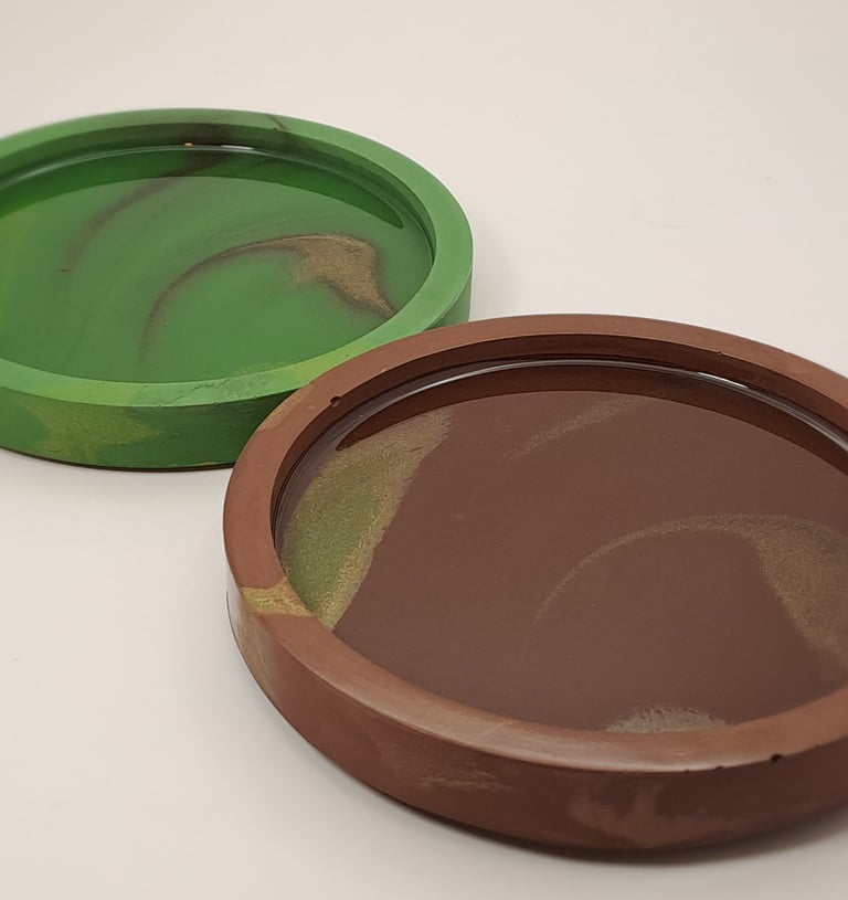 Handmade green and brown marble gypsum trays with gold accents for home decor.