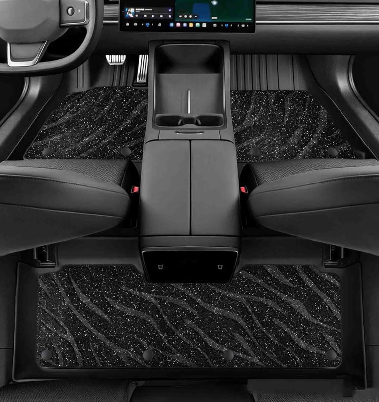 Custom black glitter car floor mats with silver tiger stripe pattern installed in a modern vehicle interior.