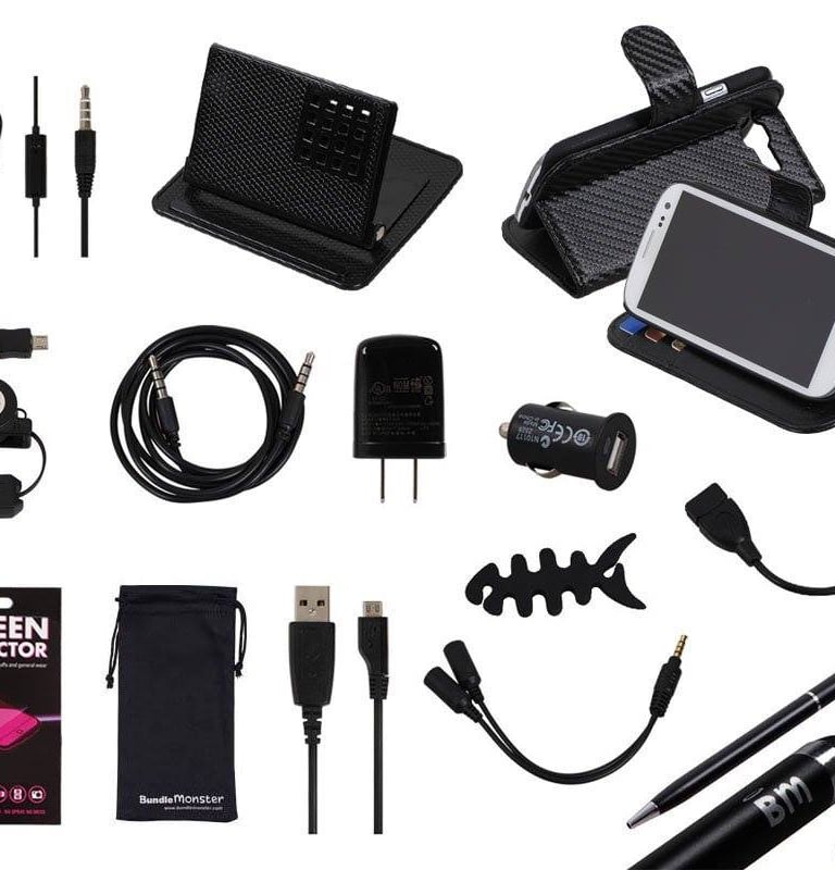 a variety of electronics and accessories including a cell phone, a pen, and a