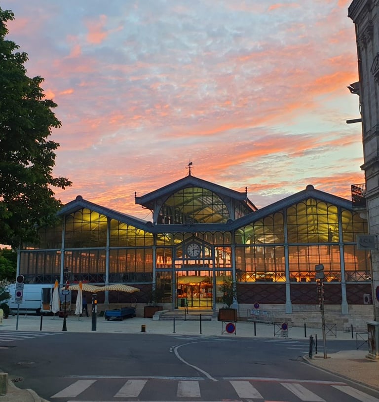 marche angouleme a building with a large glass front and a skylight