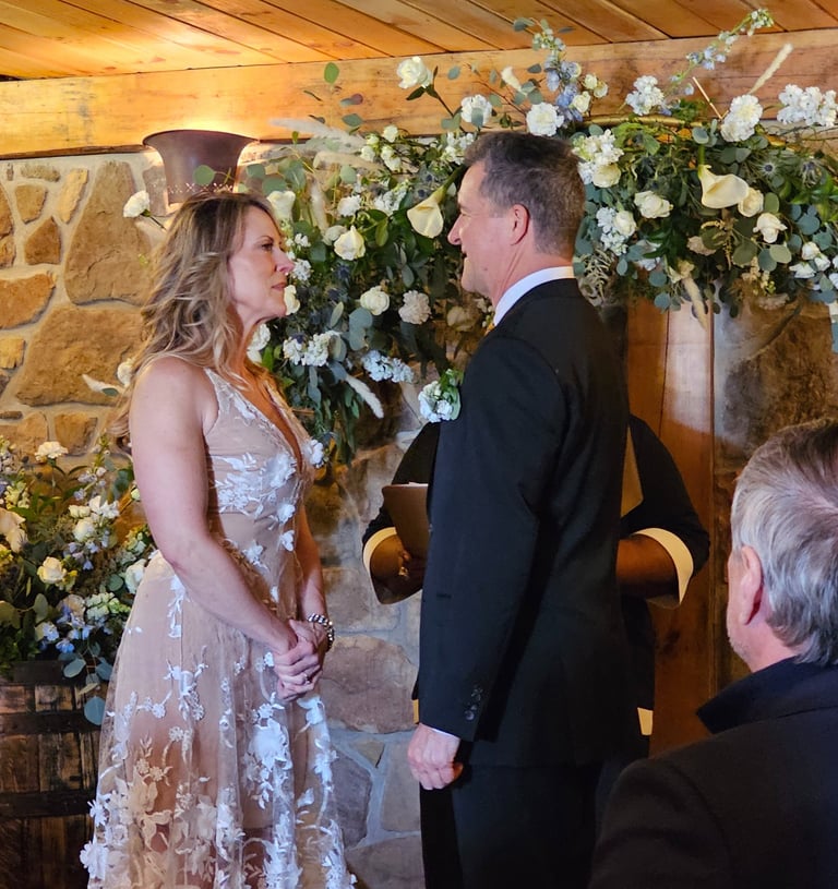 a man and woman getting married in a wedding ceremony