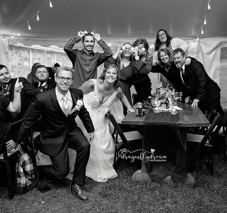 Whoto of Bridal Party with various wearable flowers