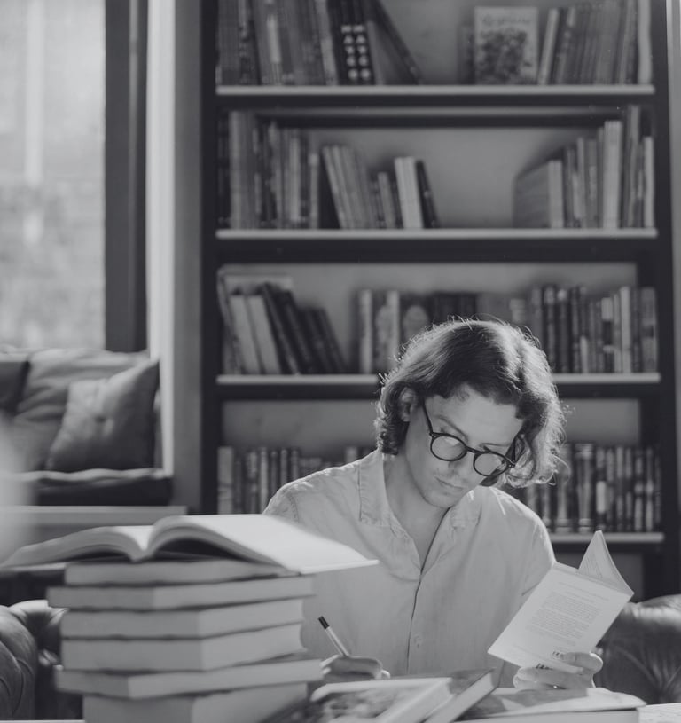 A man at an independent London bookstore creating the perfect atmosphere for slow dating encounters