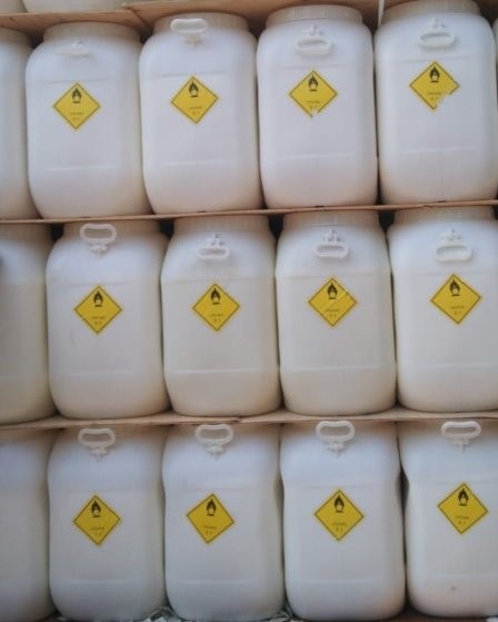 Bunch of white plastic containers with TCCA 90 granules