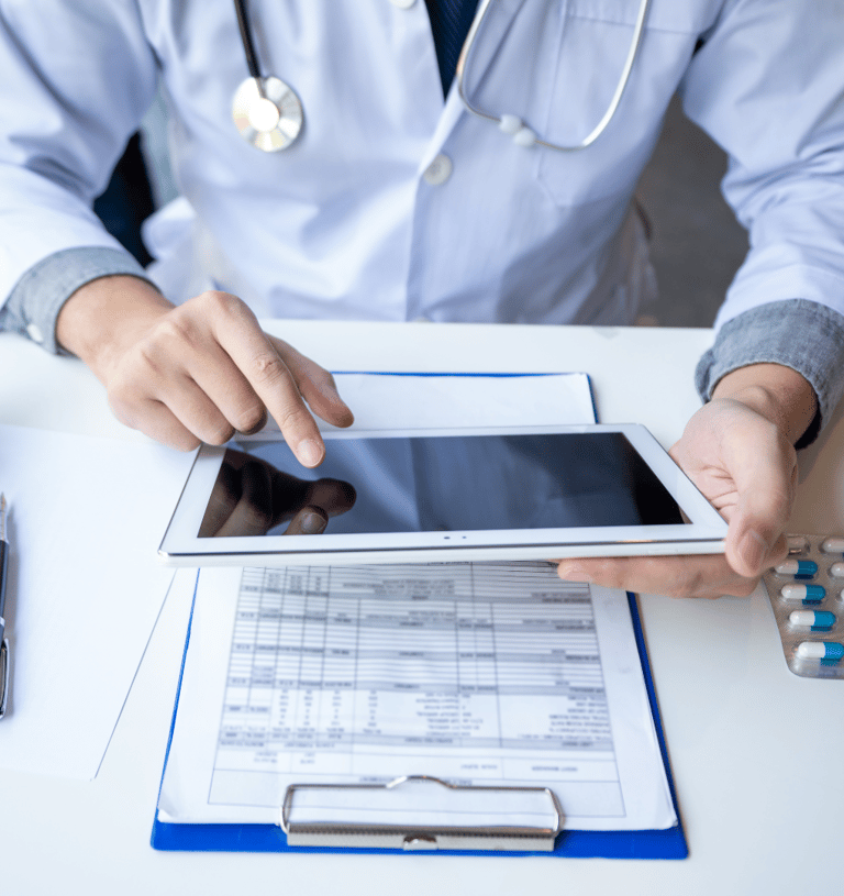 Doctor reviewing clinical subject documents through the ClinicalHawk eTMF & RM system.
