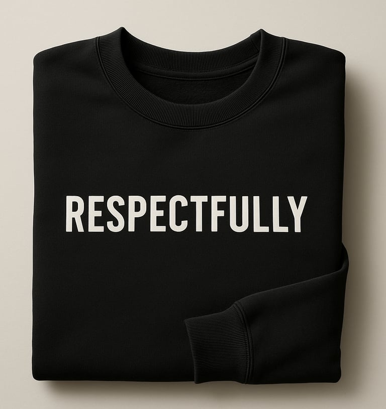 Folded crewneck sweatshirt with the word RESPECTFULLY printed across the chest in bold minimalist le