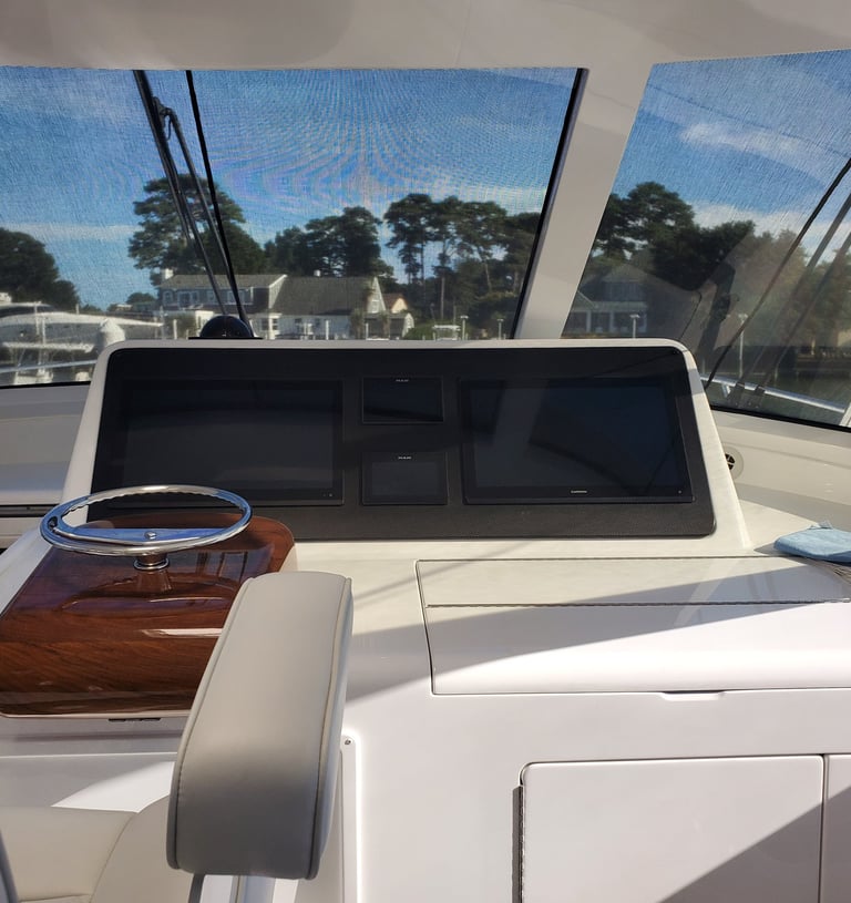 Yacht helm station with electronics and controls