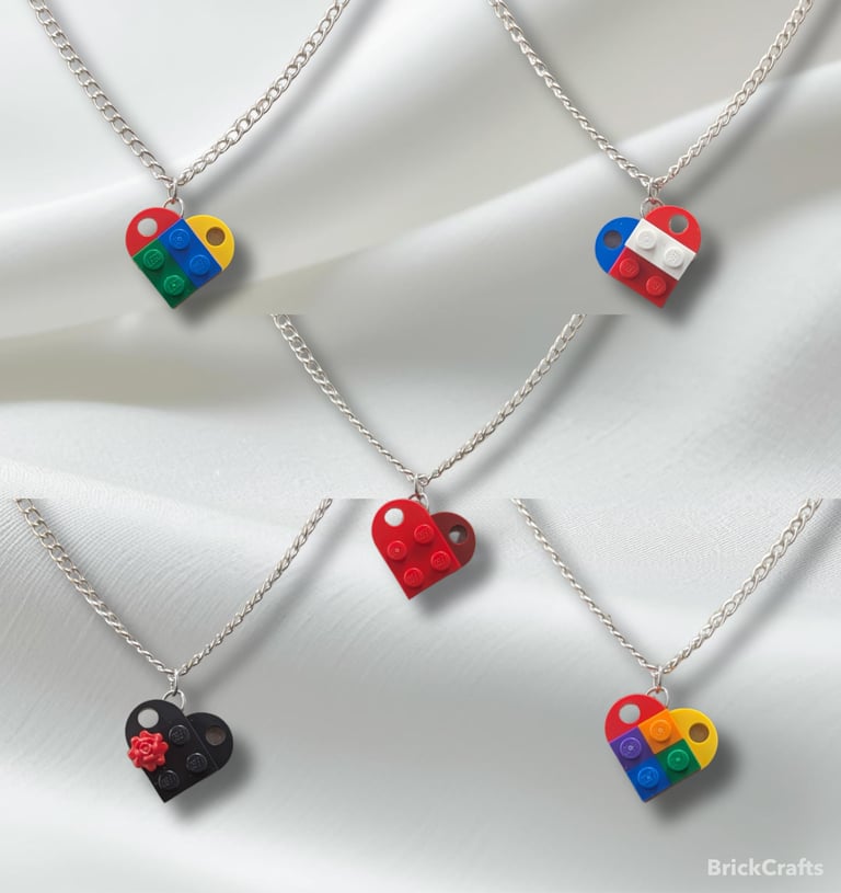 Handmade LEGO heart necklaces in various colors on silver chains for unique LEGO-themed jewelry.