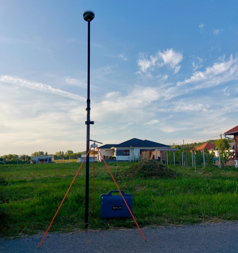 a tripod with a camera and a tripod