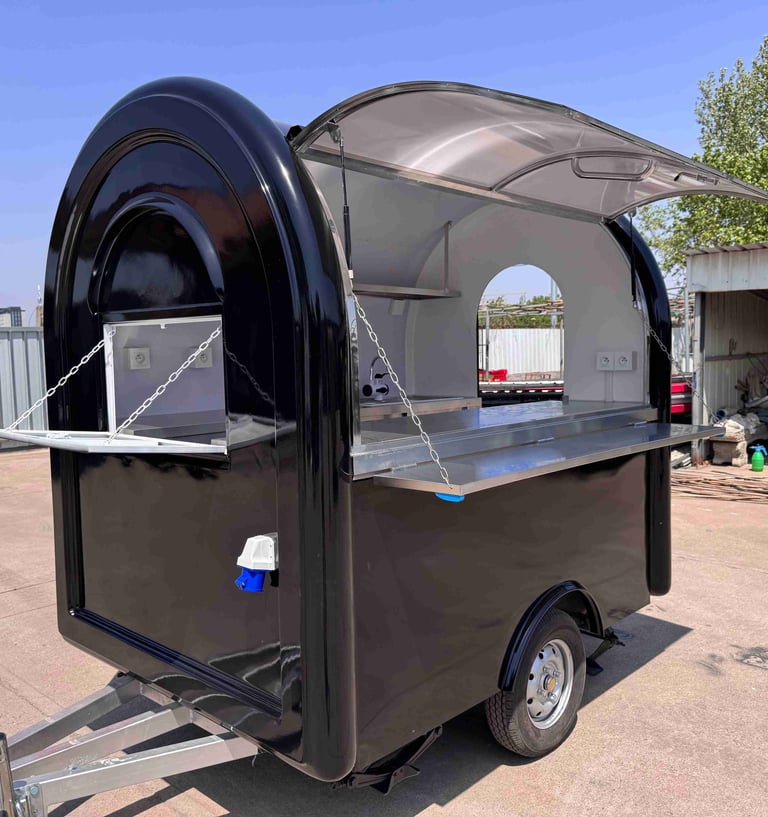 Foodtruck demi-rond TF-DM Classic couleur RAL noir foncé, finition lisse, coque en fibre de verre et châssis galvanisé, certi