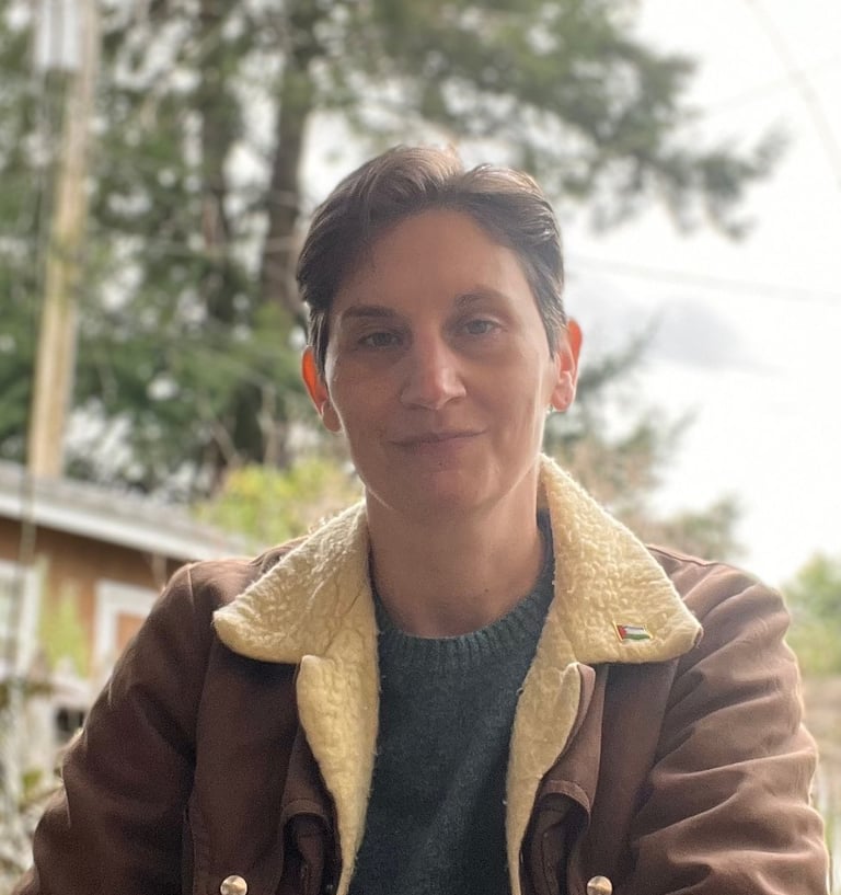 shown is Talcott Broadhead. who is white with short, dark hair & green eyes.