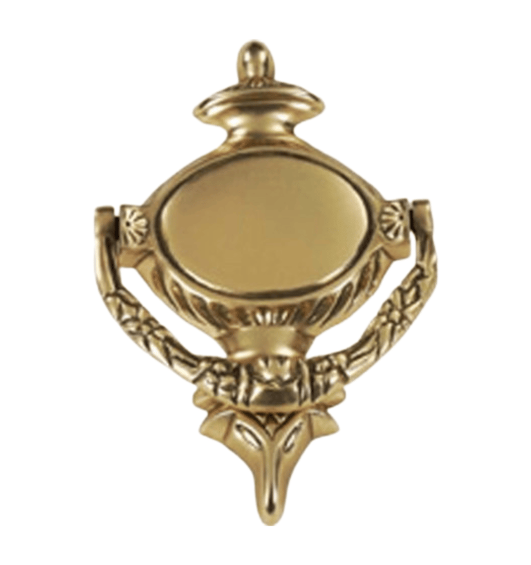 a gold colored metal object with a gold colored frame