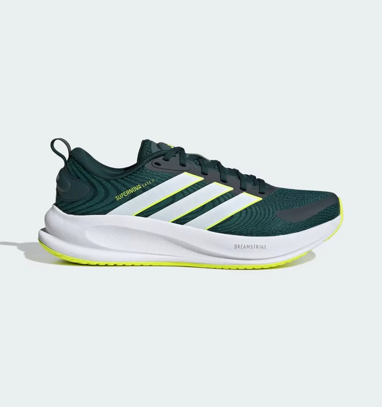 Adidas Supernova Rise running shoes in dark green mesh with white stripes and Dreamstrike foam midsole.