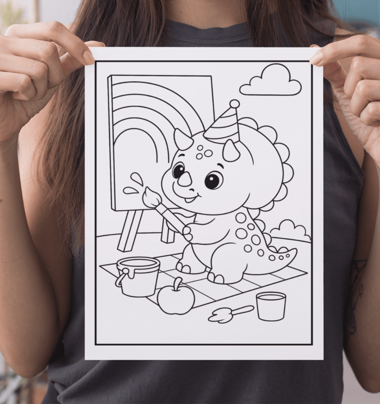a woman holding up a drawing of a baby dragon