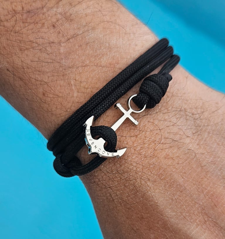 a man's bracelet with a anchor anchor on it