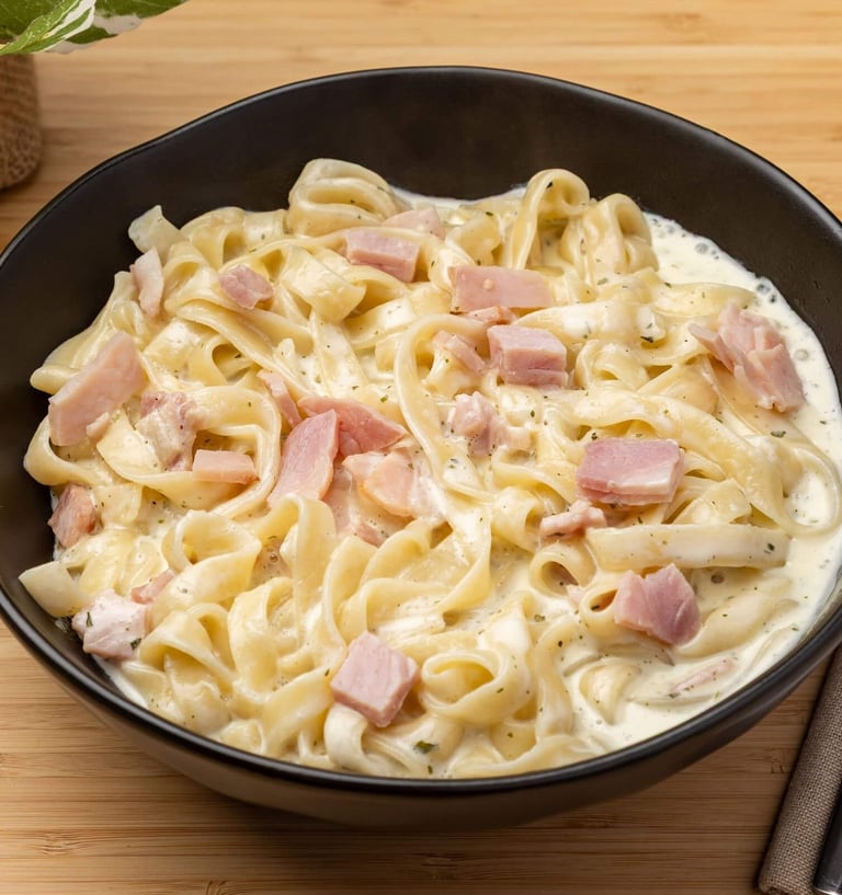 Fettuccine Carbonara Kenwick with creamy sauce and bacon at Bingo Bites
