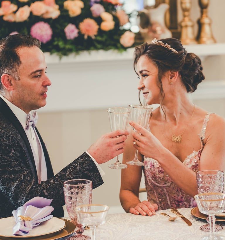 a man and woman are sitting at a table