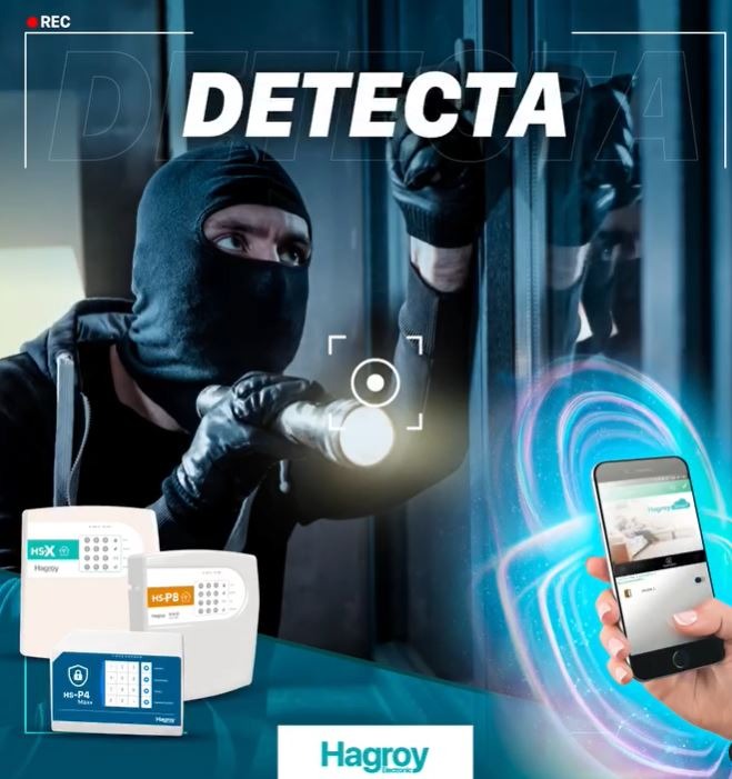 Equipo de seguridad realizando instalación de sistema de alarma profesional