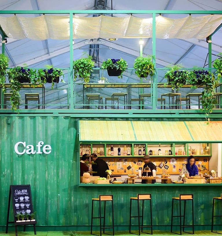 a green container container converted into a bar