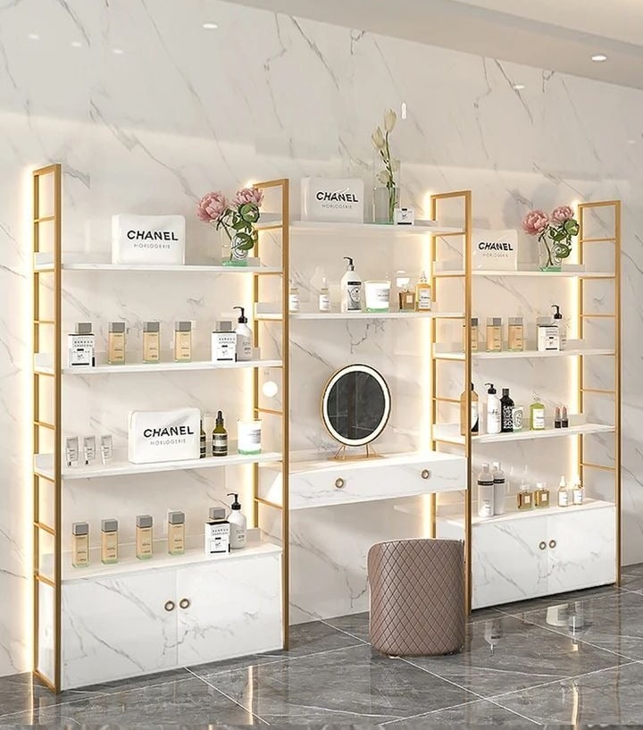 a room with a white marble floor and a white wall