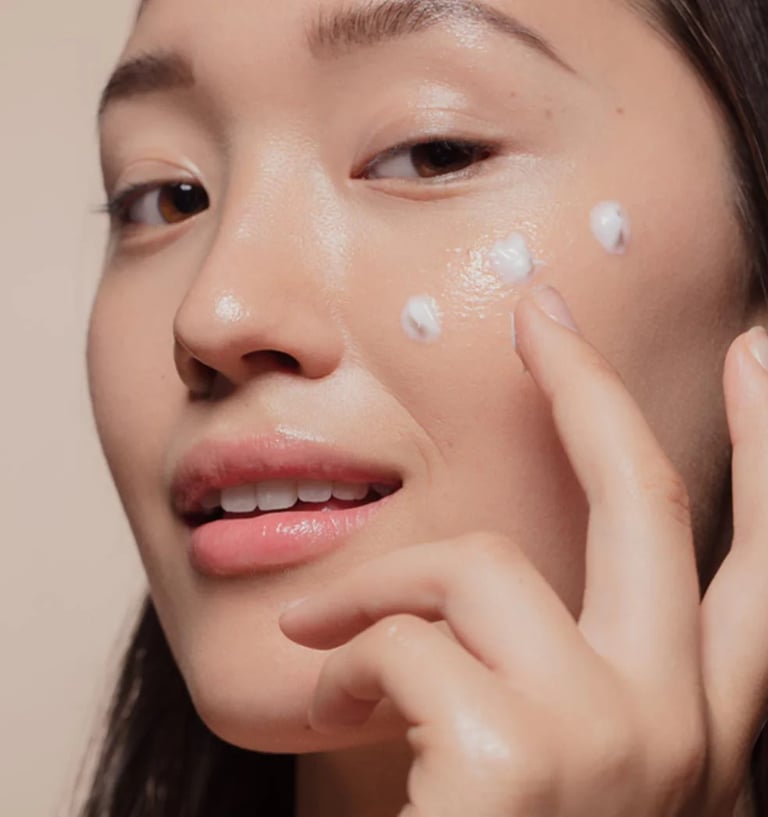 a woman with a white face and a white face with a white face and a