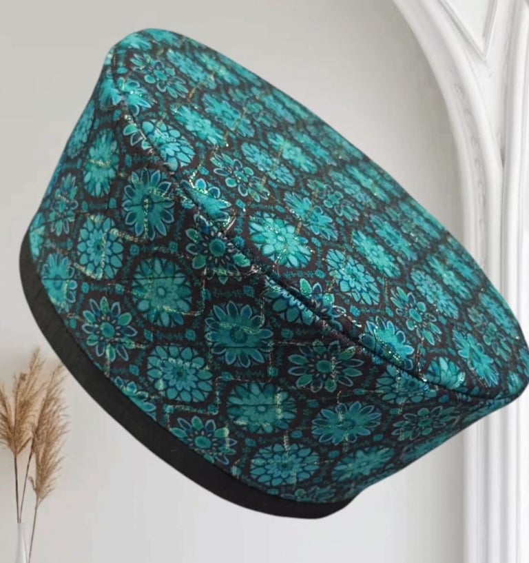 a hat - top hat with a blue and green floral pattern