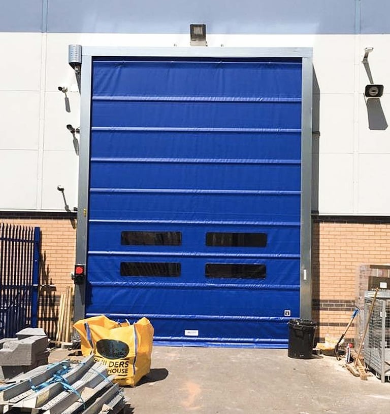 900gsm speed door in blue PVC with clear window view sections