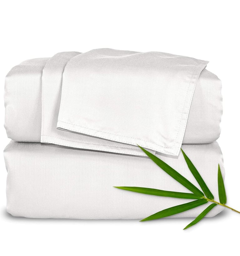 a bamboo leaf on a bed sheet set