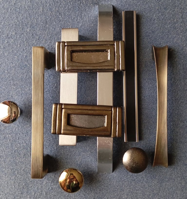 a bunch of different types of cabinet and drawer handles and knobs