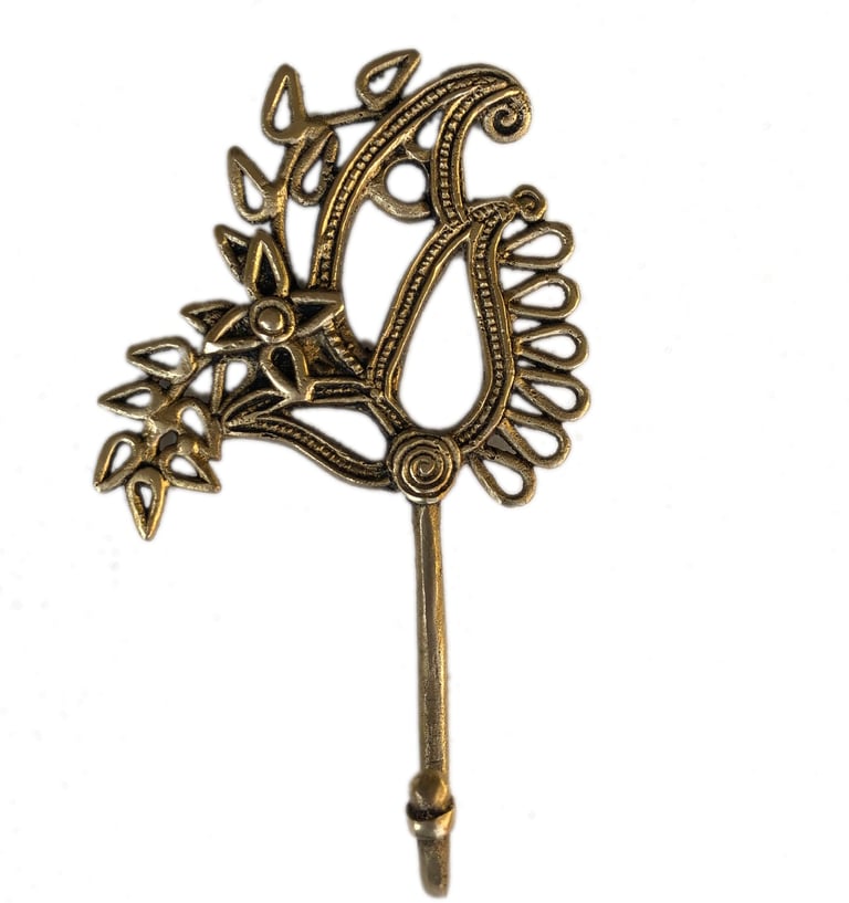 a decorative metal sticker with a bird on it