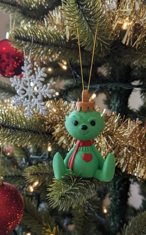 Grinch bauble with gold hanging tread