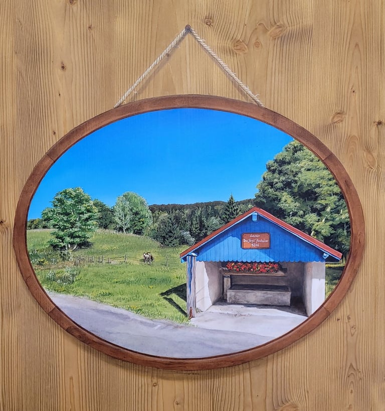 Paysage en médaillon, cadre et fixation sont peints en trompe-l'oeil sur une porte en bois massif