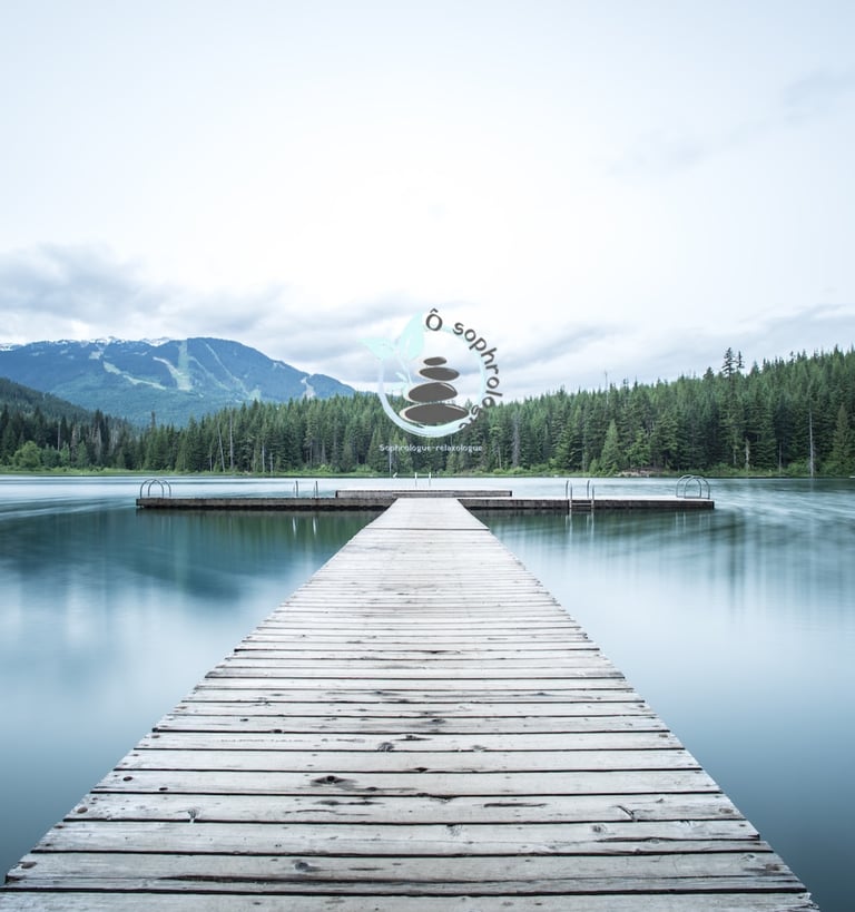 a dock with a wooden dock and a mountain in the background