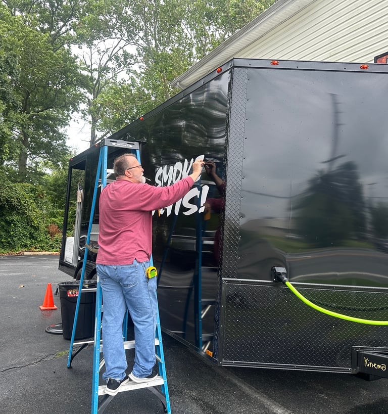 KraftyMcKrafty installing the newly created SMOKE THIS! logo. 8/12/2023